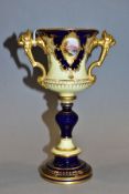 AN EARLY 20TH CENTURY COALPORT TWIN HANDLED PEDESTAL CUP, blue, yellow and gilt ground with an