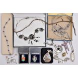 A SELECTION OF WHITE METAL JEWELLERY, to include a white metal line bracelet set with eight oval cut