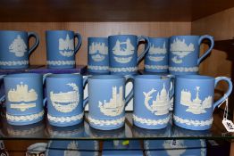 FIFTEEN WEDGWOOD PALE BLUE JASPERWARE CHRISTMAS MUGS, 1971 to 1985 inclusive, decorated with Royal
