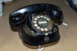 A BELGIAN MADE BELL TELEPHONE, black painted metal body with gold detailing, gilt dial and