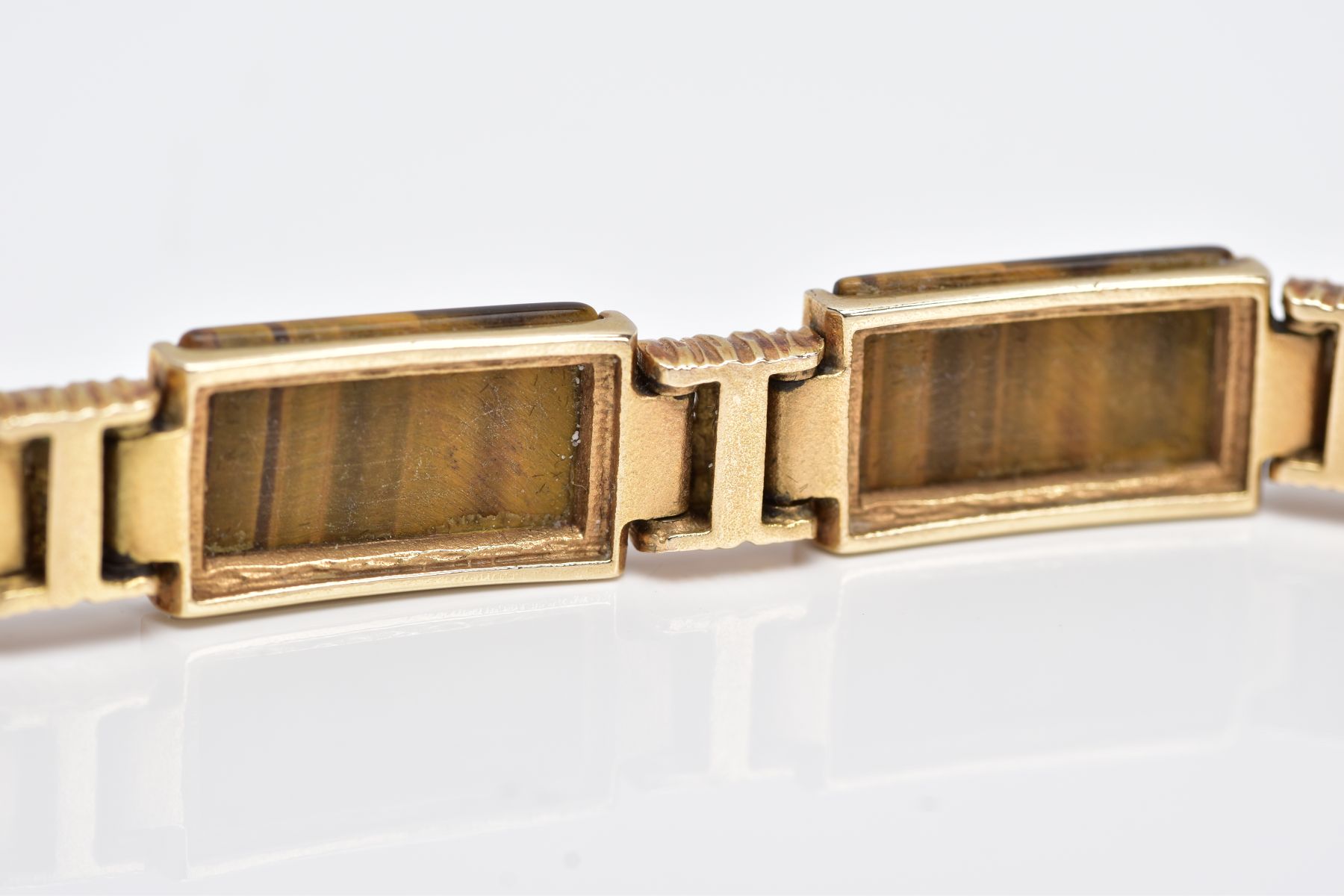 A 9CT GOLD TIGERS EYE LINE BRACELET, designed with seven rectangular shaped links set with - Image 5 of 5