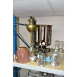 A SMALL GROUP OF LAMPS, DECANTERS, TANKARDS, etc, including a copper octagonal lantern on a