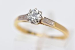 A DIAMOND SINGLE STONE RING with trap cut diamond shoulders, estimated round brilliant cut weight