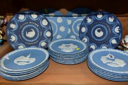 A SET OF 20 WEDGWOOD PALE BLUE JASPERWARE CHRISTMAS PLATES, 1969 TO 1988 inclusive, with seven