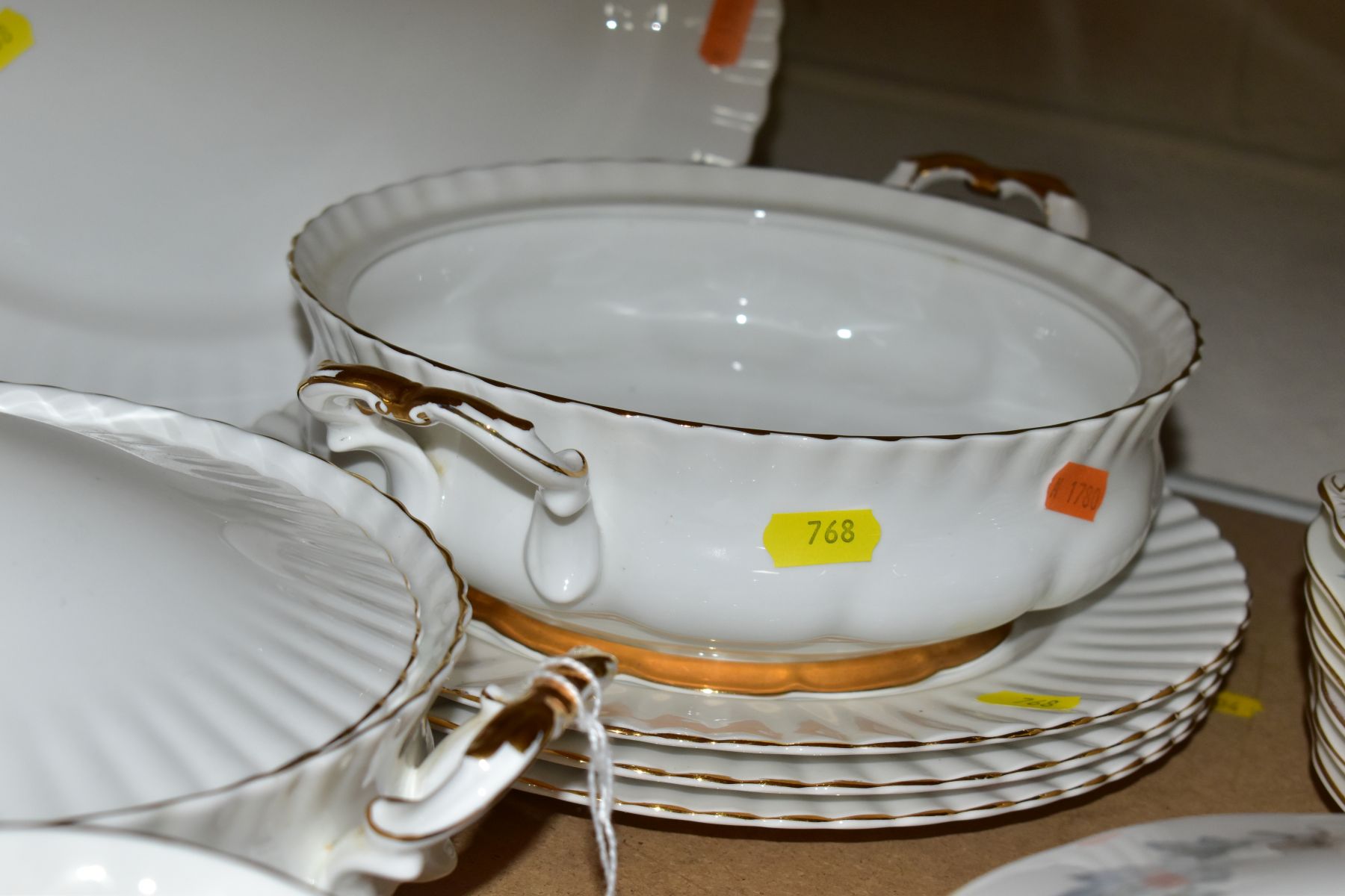 A ROYAL ALBERT VAL D'OR PART DINNER SERVICE, comprising seven soup bowls and six saucers, an oval - Image 3 of 7