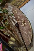 A LARGE 19TH CENTURY COW HIDE SOUTH AFRICAN ZULU NGUNI SHIELD, height 147cm, together with a wire