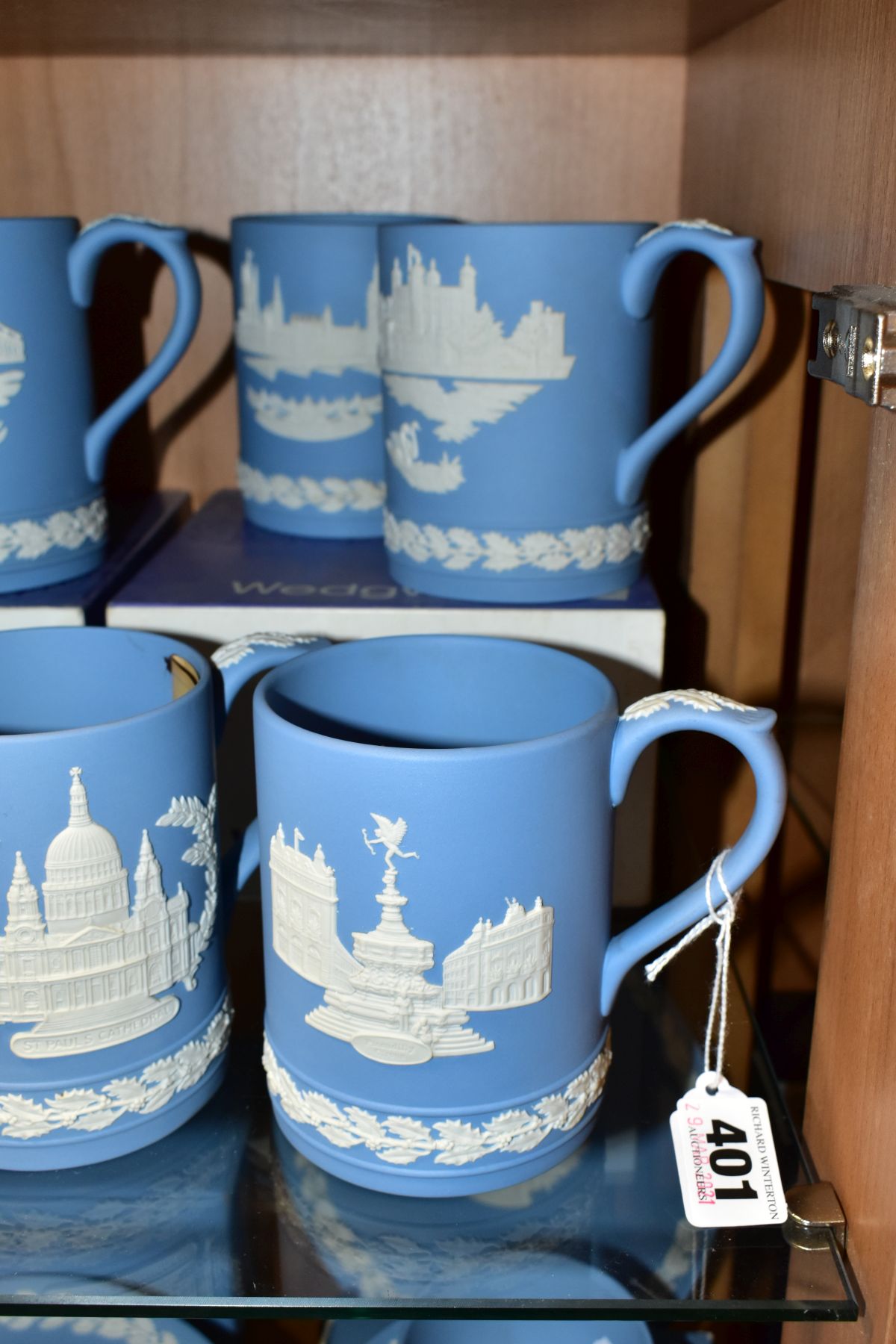 FIFTEEN WEDGWOOD PALE BLUE JASPERWARE CHRISTMAS MUGS, 1971 to 1985 inclusive, decorated with Royal - Image 3 of 9