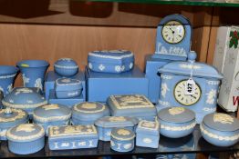 WEDGWOOD PALE BLUE JASPERWARES, to include clocks, height 16.5cm and 12cm (boxed), a jardiniere,