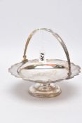 A SILVER BASKET, of a circular form, decorative wavy rim and handle, on a circular base,