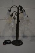A REPRODUCTION SIX BRANCH TABLE LAMP with frosted glass shades