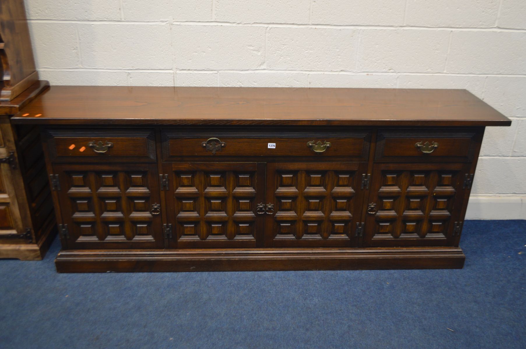 A YOUNGER OAK FOUR DOOR SIDEBOARD with three drawers, width 206cm x depth 47cm x height 78cm and a - Image 2 of 3