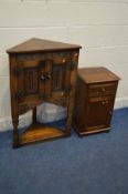 A REPRODUCTION OAK TWO DOOR CORNER UNIT, width 65cm x depth 37cm x height 97cm and an oak bedside