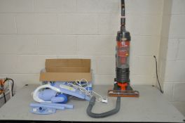 A VAX MACH AIR UPRIGHT VACUUM CLEANER and a Black and Decker VH900 hand held corded vacuum cleaner