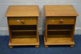 A PAIR OF PINE BEDSIDE CABINETS with a single drawer