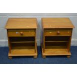 A PAIR OF PINE BEDSIDE CABINETS with a single drawer