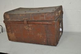 A VINTAGE TIN TRUNK 69cm wide 50cm deep and 44cm high (distressed)