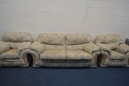 A FLORAL UPHOLSTERED THREE PIECE LOUNGE SUITE