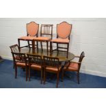 A MAHOGANY TWIN PEDESTAL DINING TABLE, one additional leaf, and six chairs together with two