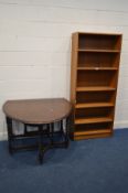 AN OAK BARLEY TWIST OVAL TOPPED GATE LEG TABLE, along with a teak open bookcase, width 76cm x