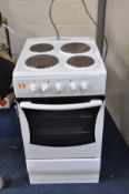 AN AMICA ELECTRIC COOKER with four top rings and a single oven (Untested)