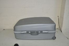 A REVELATION HARD SHELL SUITCASE 80cm high 58cm wide, 34cm deep