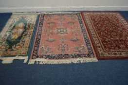 A MODERN YATZ RED GROUND RUG, 180cm x 123cm, a Chinese woollen carpet runner and a pink rug (3)