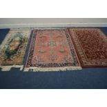 A MODERN YATZ RED GROUND RUG, 180cm x 123cm, a Chinese woollen carpet runner and a pink rug (3)