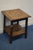 A BESPOKE EARLY TO MID 20TH CENTURY HEAVILY CARVED OAK TWO TIER TABLE, signed under table and