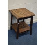 A BESPOKE EARLY TO MID 20TH CENTURY HEAVILY CARVED OAK TWO TIER TABLE, signed under table and