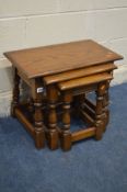 AN OLD CHARM OAK NEST OF THREE TABLES, largest table width 61cm x depth 33cm x height 46cm
