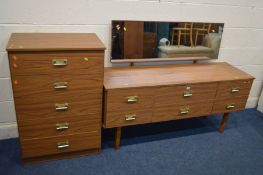 A MID 20TH CENTURY TEAK FINISH DRESSING TABLE, with a rectangular mirror and six drawers, width