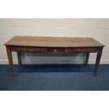 A LONG EARLY 20TH CENTURY OAK SLOPPED WRITING TABLE, with two drawers, length 206cm x depth 69cm x