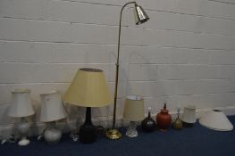 EIGHT VARIOUS TABLE LAMPS of various styles, materials and sizes, along with a brassed floor