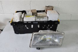 A TRAY CONTAINING FORD AND AUSTIN ROVER HEADLIGHTS AND INDICATORS from Mk1 Montego, Mk2 Fiesta,