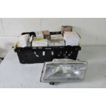 A TRAY CONTAINING FORD AND AUSTIN ROVER HEADLIGHTS AND INDICATORS from Mk1 Montego, Mk2 Fiesta,
