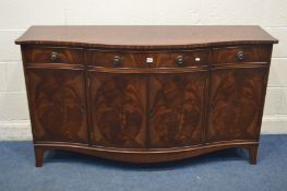 A REPRODUCTION MAHOGANY SERPENTINE SIDEBOARD, with three various drawers, on bracket feet, width