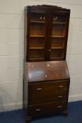 AN ART DECO OAK GLAZED TWO DOOR BUREAU BOOKCASE, width 72cm x depth 41cm x height 189cm (Sd to