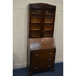 AN ART DECO OAK GLAZED TWO DOOR BUREAU BOOKCASE, width 72cm x depth 41cm x height 189cm (Sd to