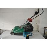 A QUALCAST TURBOVAC ELECTRIC LAWNMOWER with grass box (PAT pass and working) and a Black and