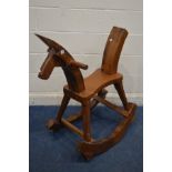 A BESPOKE HARDWOOD ROCKING HORSE