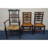 A PERIOD OAK SPINDLE BACK COUNTRY ELBOW CHAIR, with a rush seat (Sd) along with a near pair of oak