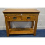 A SOLID GOLDEN OAK SIDE TABLE with two drawers, on square legs united by an undershelf, width 98cm x