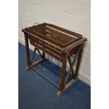 A 19TH CENTURY SCUMBLED PINE ROCKING CRIB/COT, the slatted crib with twin handles, on a removable