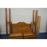 A PINE 5FT BEDSTEAD with side rails containing two drawers each, slats and bolts