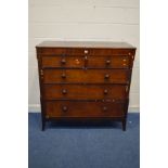 A GEORGE III OAK, MAHOGANY AND INLAID CHEST OF TWO SHORT AND THREE LONG GRADUATED DRAWERS, on slim