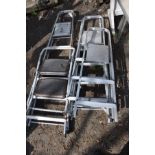 FOUR SETS OF ALUMINIUM LADDERS, the biggest at length 190cm together with another smaller set