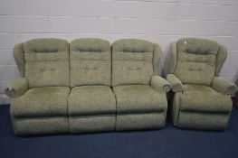 A GREEN UPHOLSTERED TWO PIECE LOUNGE SUITE, comprising a three seater settee and a manual