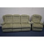 A GREEN UPHOLSTERED TWO PIECE LOUNGE SUITE, comprising a three seater settee and a manual