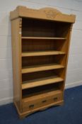 A PINE OPEN BOOKCASE above a single drawer, width 107cm x depth 60cm x height 200cm (converted
