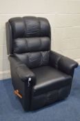 A LAZY BOY BLACK LEATHER MANUAL RECLINING ARMCHAIRS (clean condition)